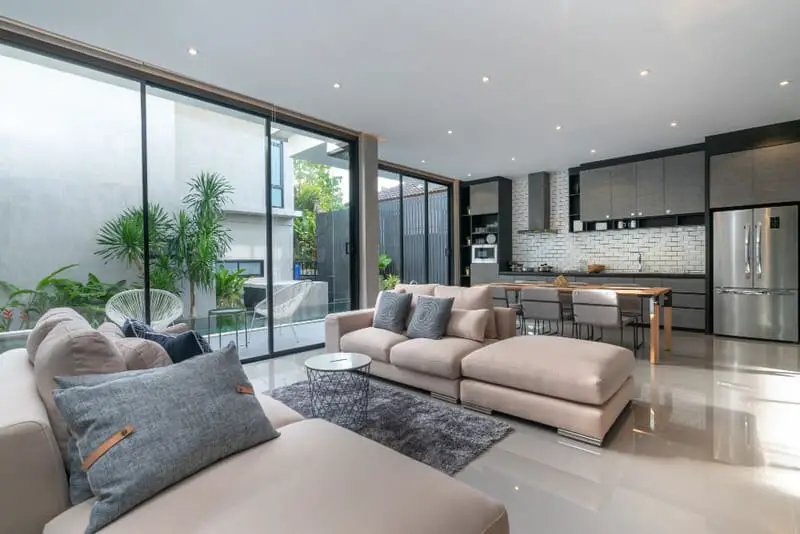 The open-space living and dining room of a million-dollar house.