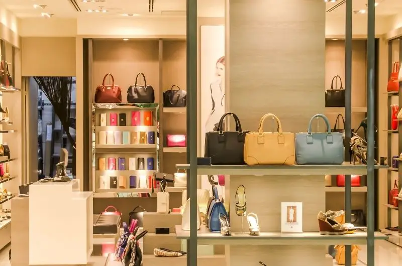 A luxury fashion store selling high end hand bags and shoes