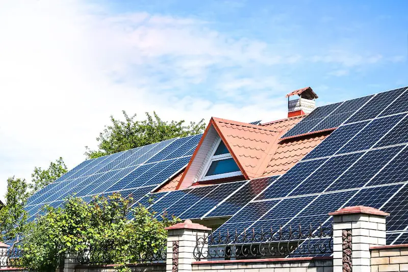 A house roof with solar panels installed on it