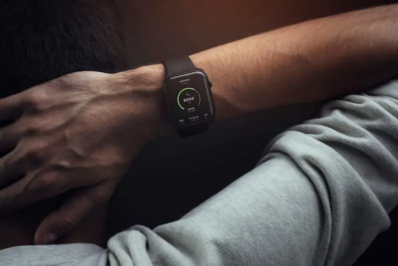 A man is exercising with his Apple Watch activated, to measure his activity.