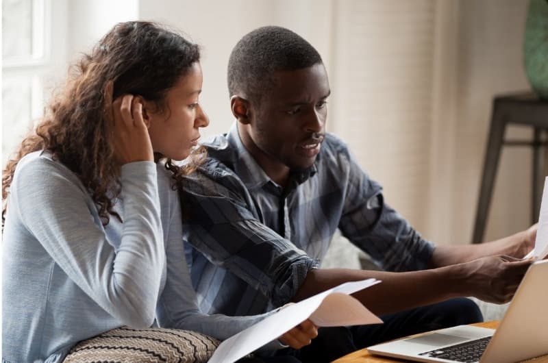 A young couple are stressed out even more after meeting their financial advisor, who is using fear tactics to stress them about their money allocation mistakes.